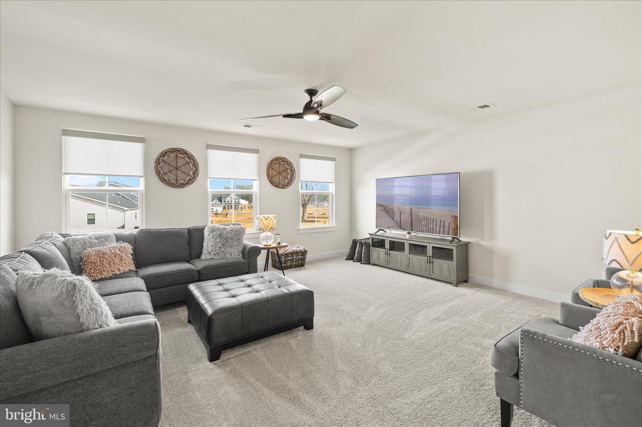 32225 Heritage Road Lewes, DE 19958 - Photo 36 of 74 a living room with furniture and a large window