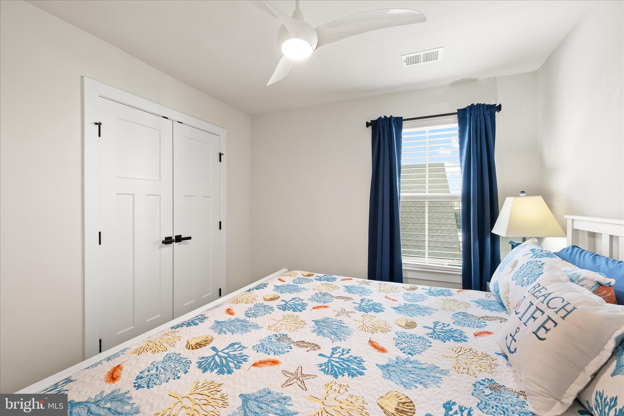 32225 Heritage Road Lewes, DE 19958 - Photo 44 of 74 a bedroom with a bed and a window