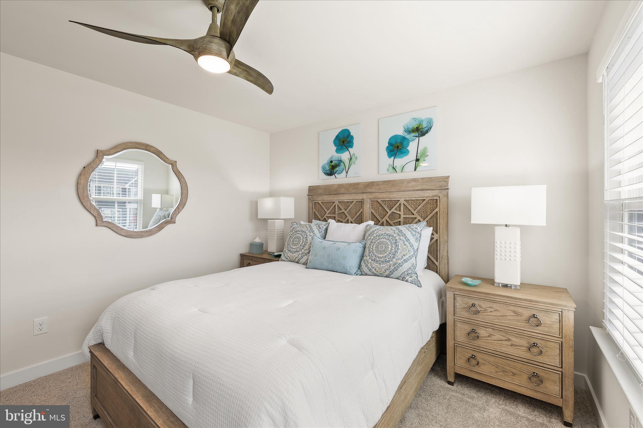 32225 Heritage Road Lewes, DE 19958 - Photo 47 of 74 a bedroom with a bed and a window