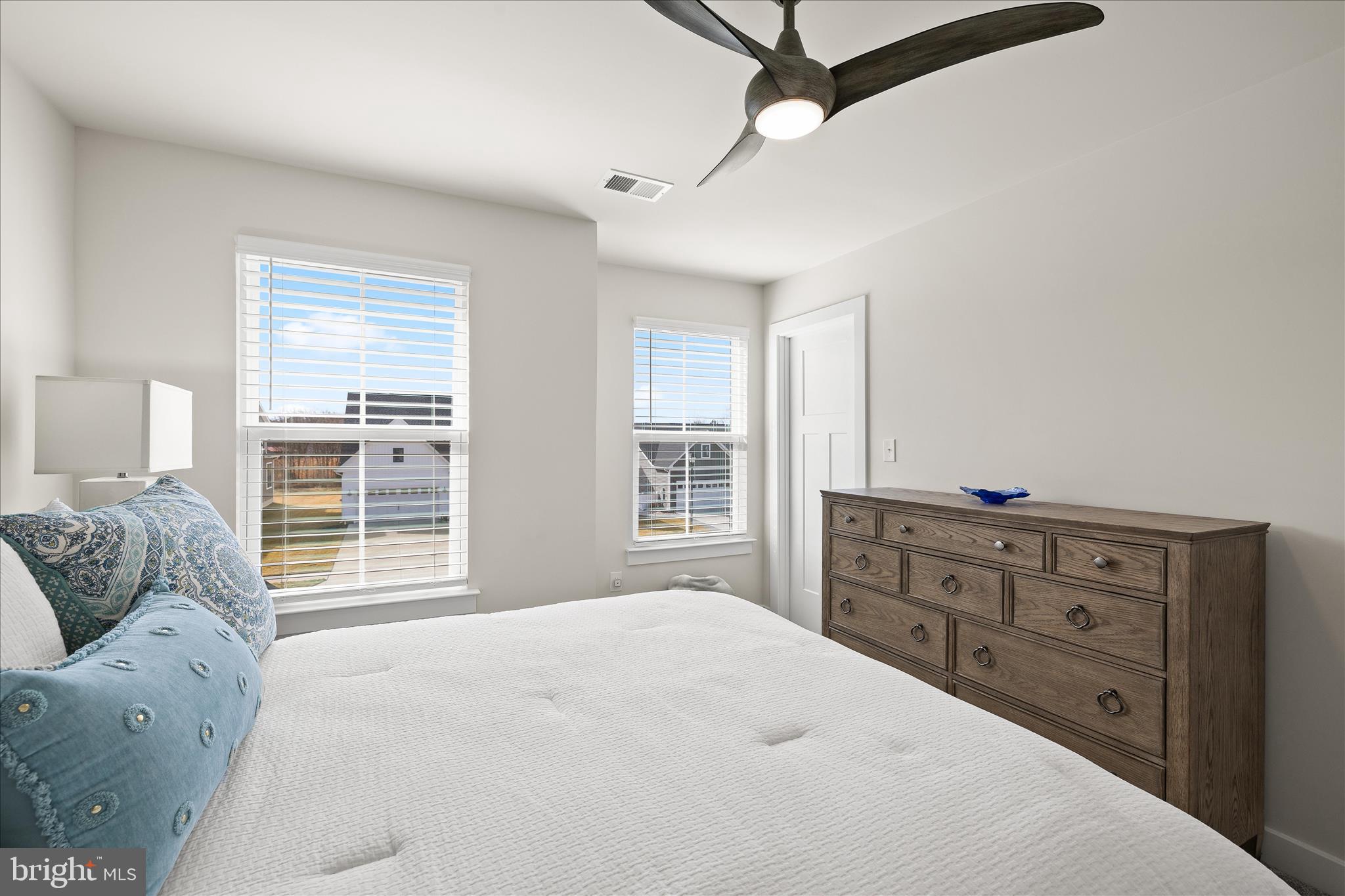 32225 Heritage Road Lewes, DE 19958 - Photo 48 of 74 a bedroom with a bed and a window