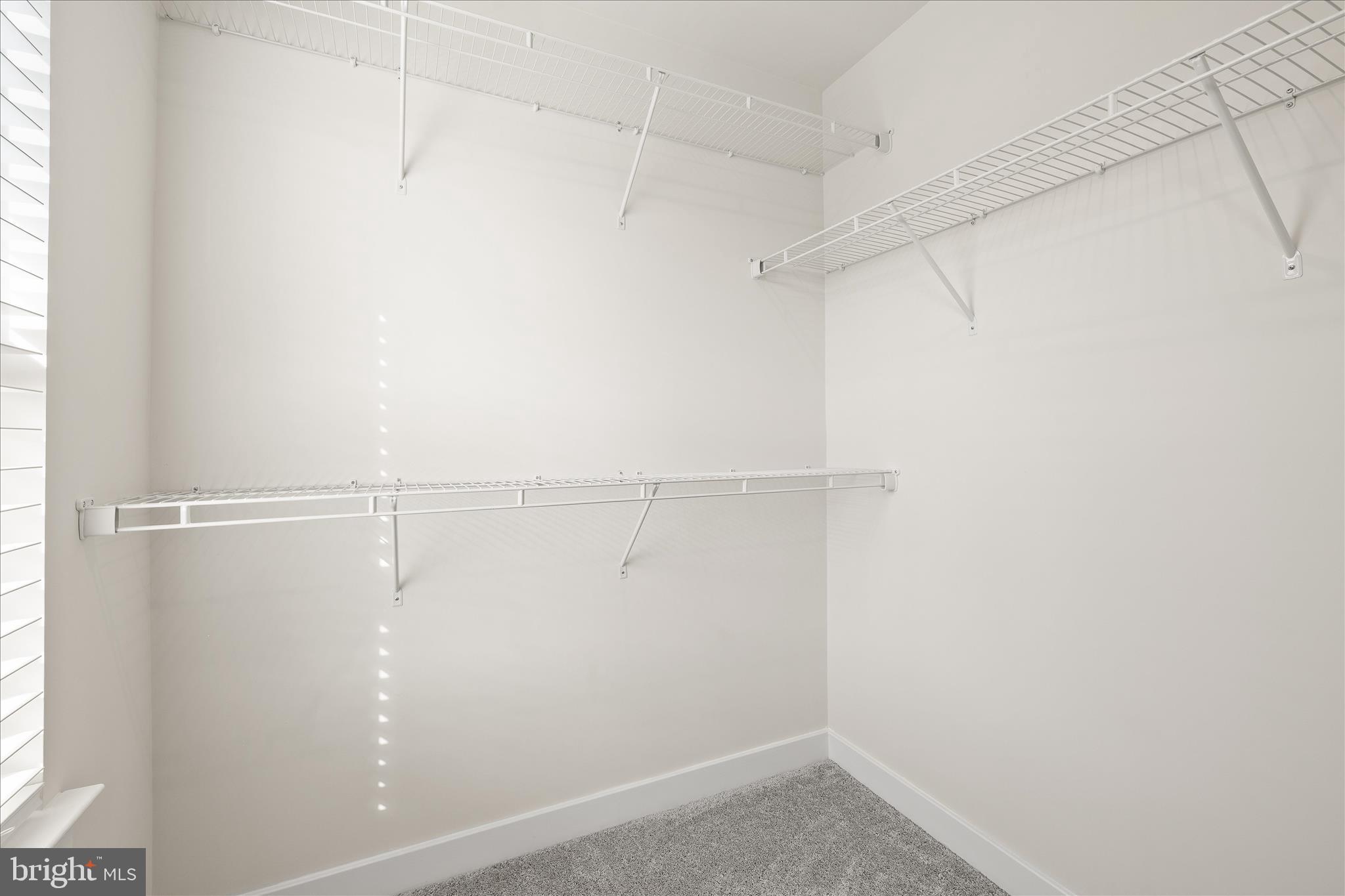 32225 Heritage Road Lewes, DE 19958 - Photo 49 of 74 a view of a room with racks on the wall