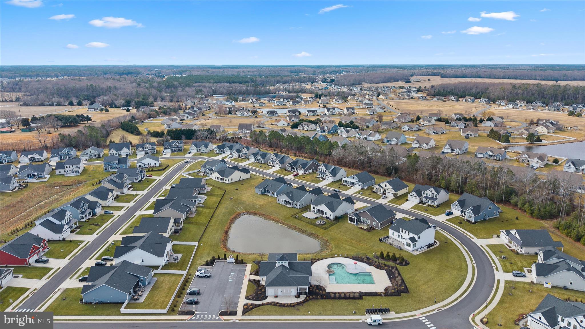 32225 Heritage Road Lewes, DE 19958 - Photo 69 of 74 an aerial view of a house with a swimming pool patio and outdoor seating
