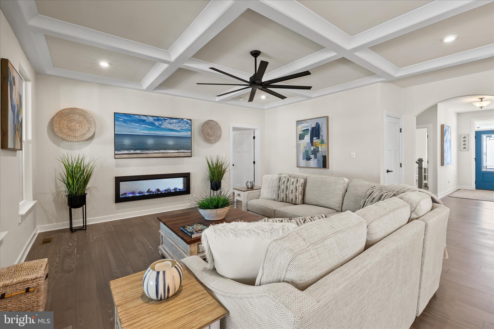 32225 Heritage Road Lewes, DE 19958 - Photo 7 of 74 a living room with furniture and a fireplace