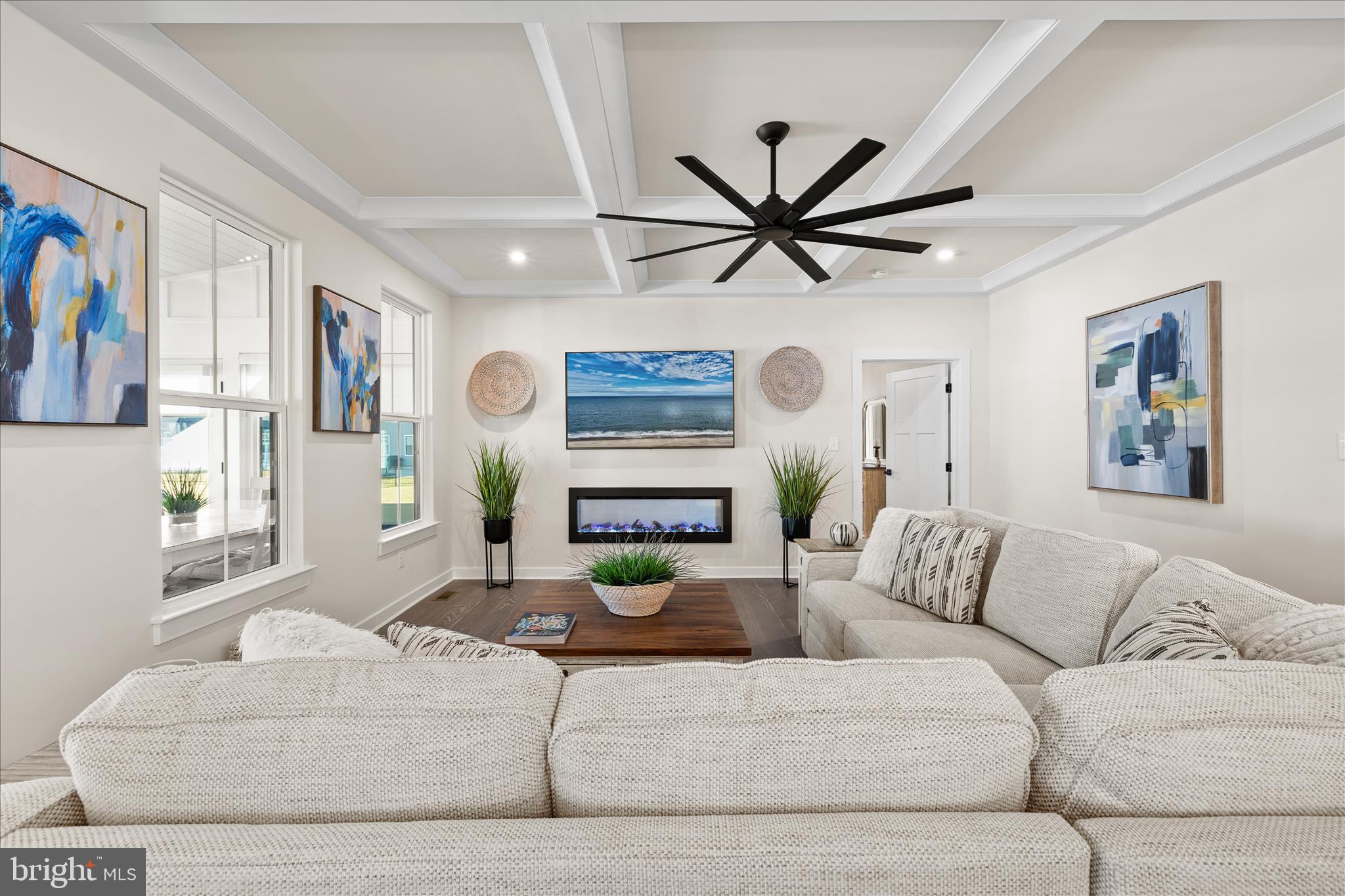 32225 Heritage Road Lewes, DE 19958 - Photo 8 of 74 a living room with furniture and a fireplace