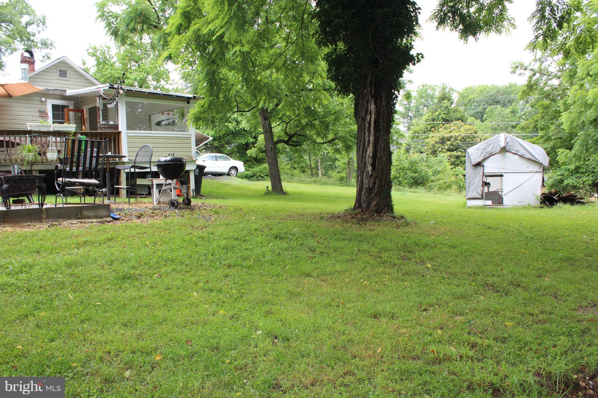 13361 Old Fort Road Fort Washington, MD 20744 - Photo 17 of 25 The huge backyard is perfect for entertaining.