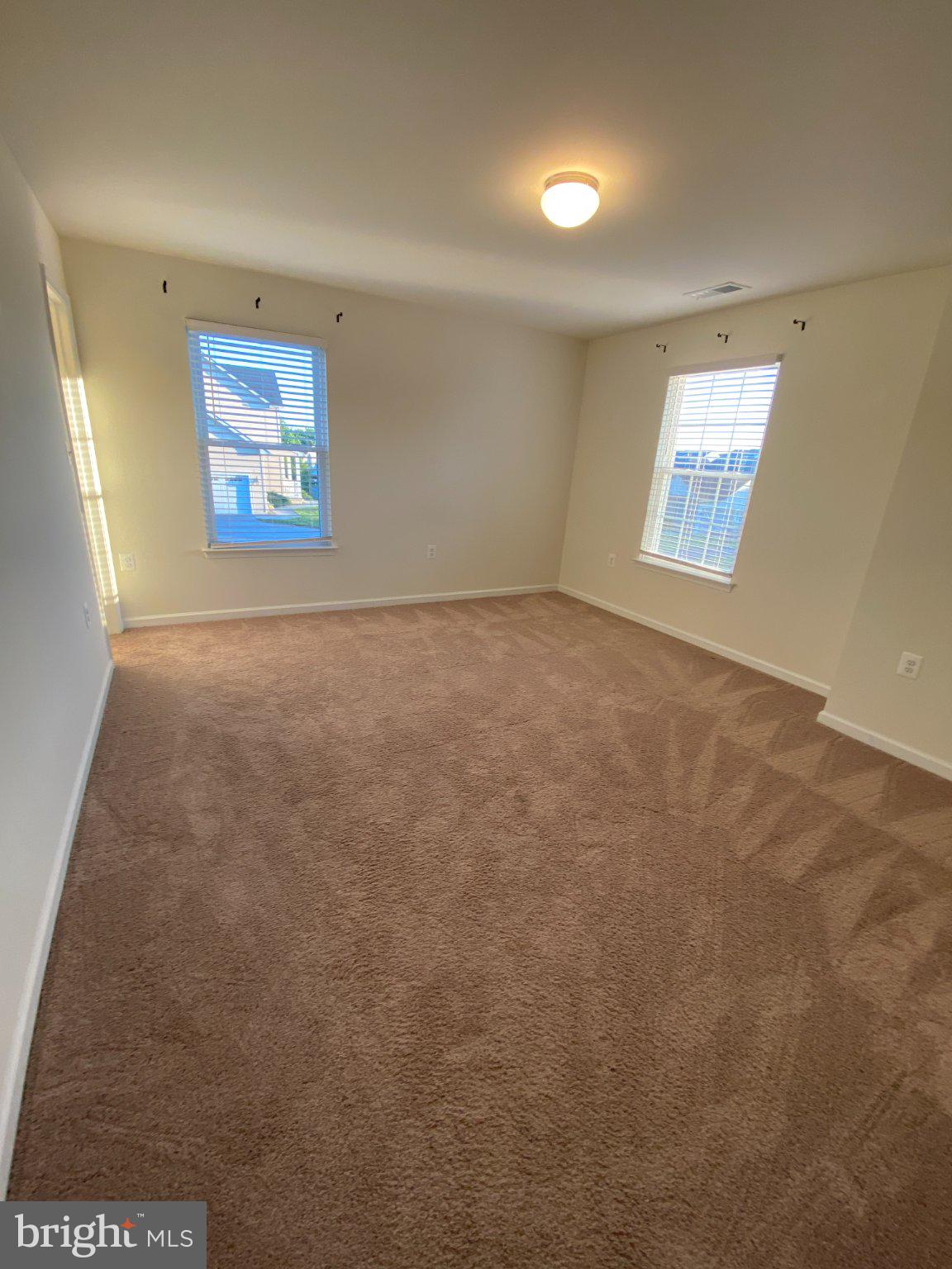 697 Rivanna Run Falling Waters, WV 25419 - Photo 34 of 44 an empty room with windows