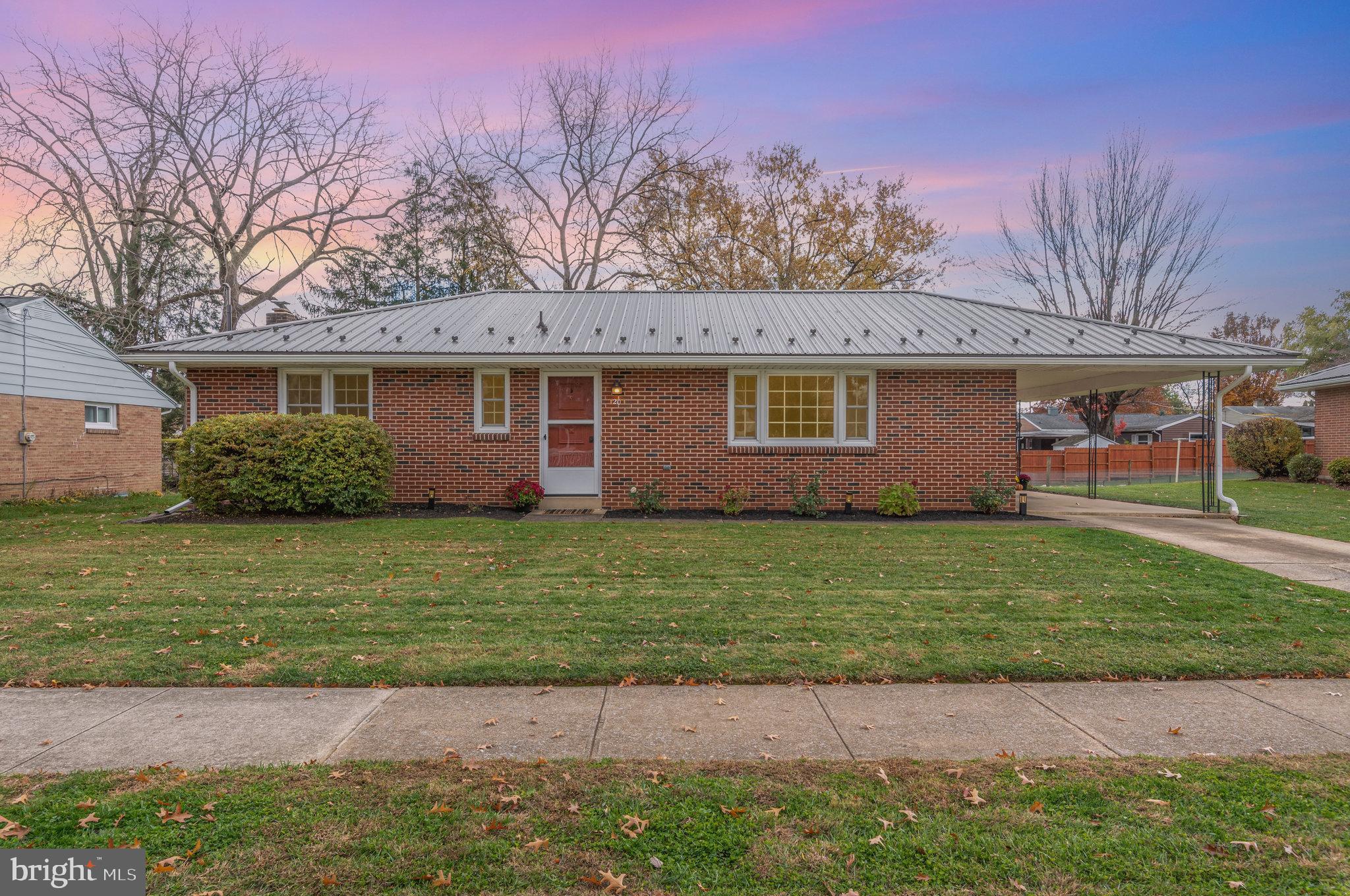 20 Chestnut Street Camp Hill, PA 17011 - Photo 1 of 26 a front view of a house with a garden