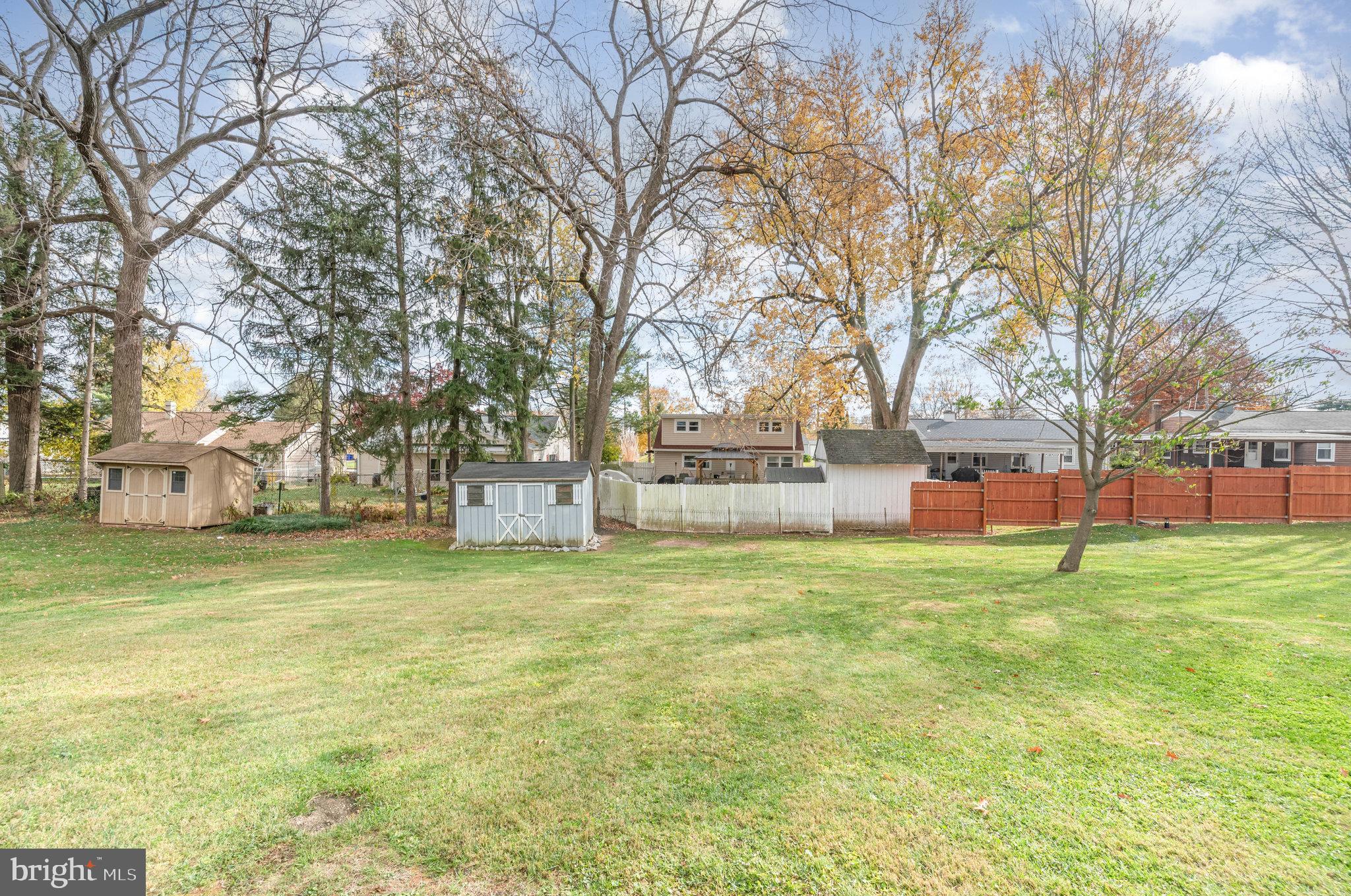 20 Chestnut Street Camp Hill, PA 17011 - Photo 22 of 26 a backyard of apartments with large trees