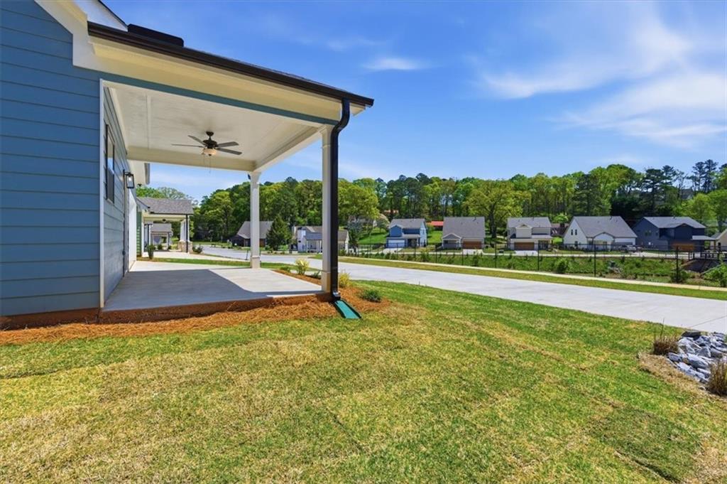 141 Old Alabama Road Southeast Emerson, GA 30137 - Photo 40 of 47 a view of a swimming pool with an outdoor seating and a yard