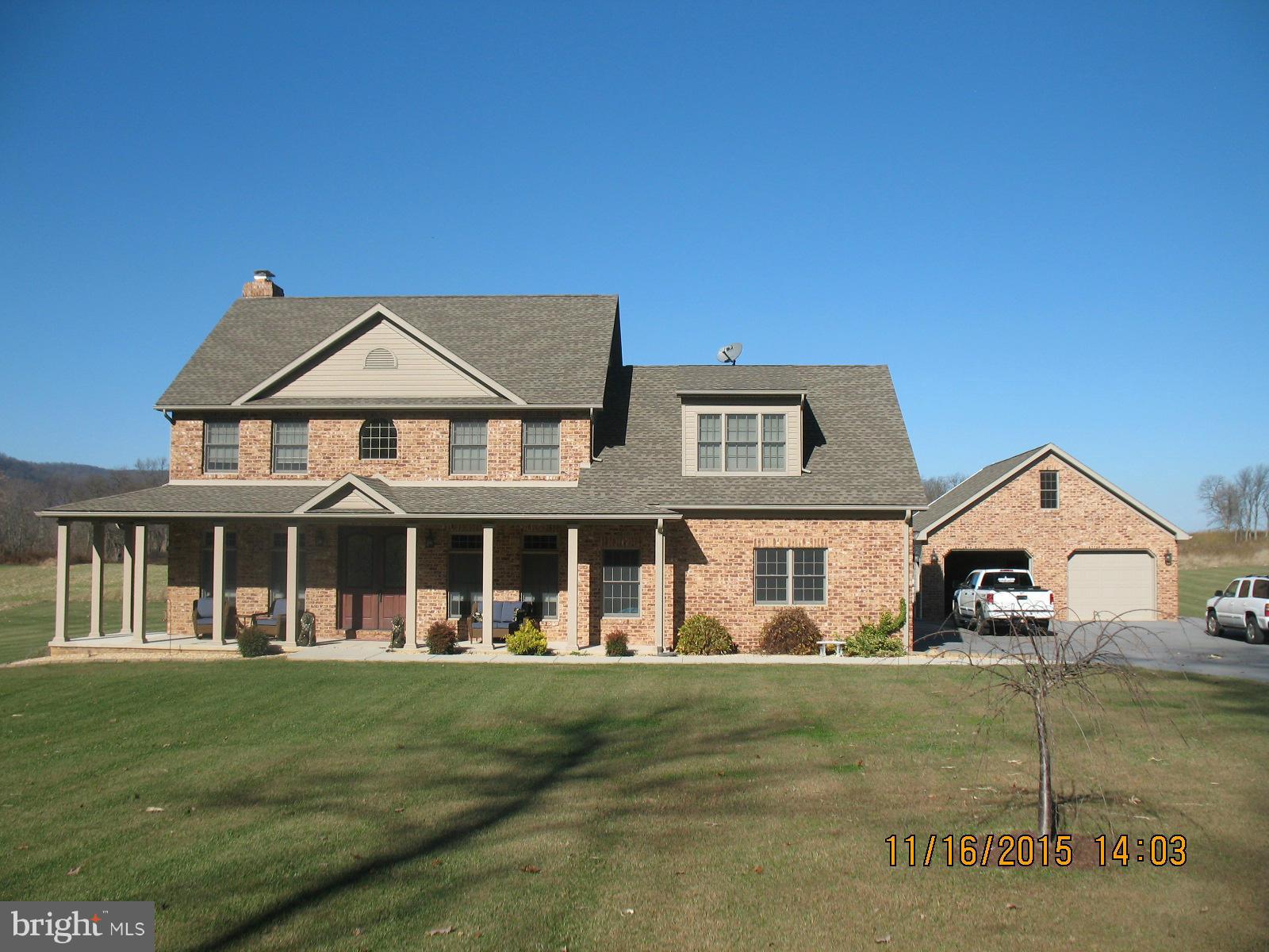 13908 Barnhart Road Clear Spring, MD 21722 - Photo 1 of 16 a front view of a house with garden
