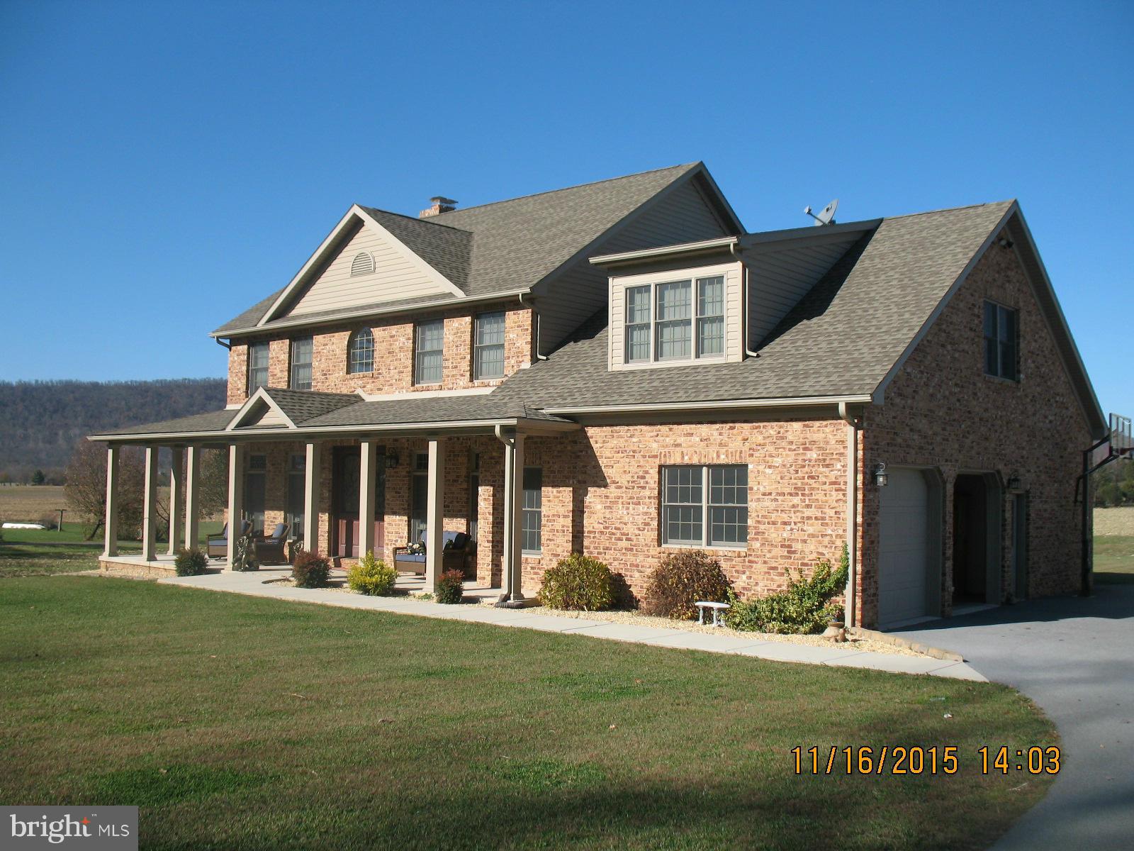 13908 Barnhart Road Clear Spring, MD 21722 - Photo 2 of 16 a front view of a house with a yard
