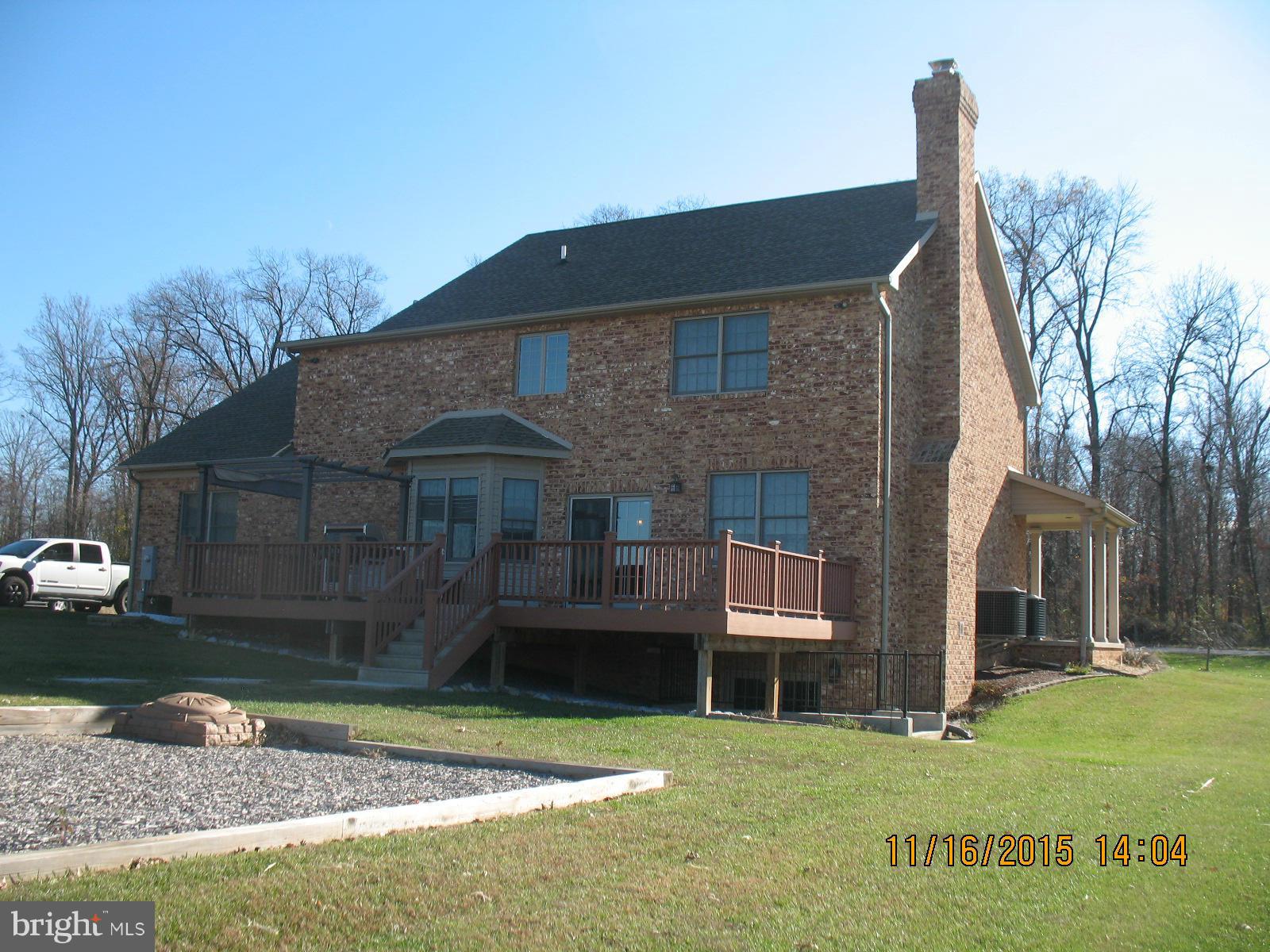 13908 Barnhart Road Clear Spring, MD 21722 - Photo 3 of 16 a front view of a house with a garden