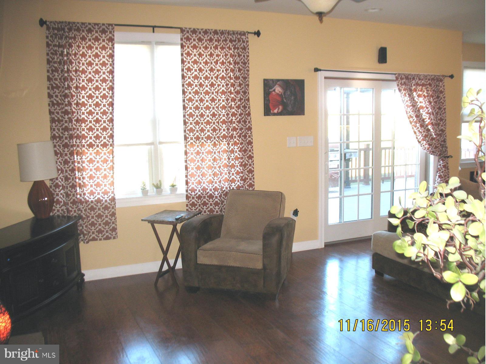 13908 Barnhart Road Clear Spring, MD 21722 - Photo 6 of 16 a living room with furniture and a large window