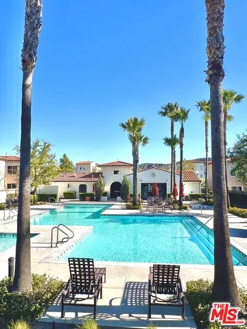 a view of a park with large trees