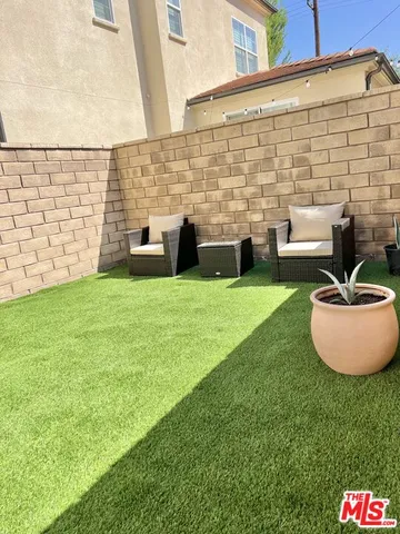 a view of an outdoor space with swimming pool