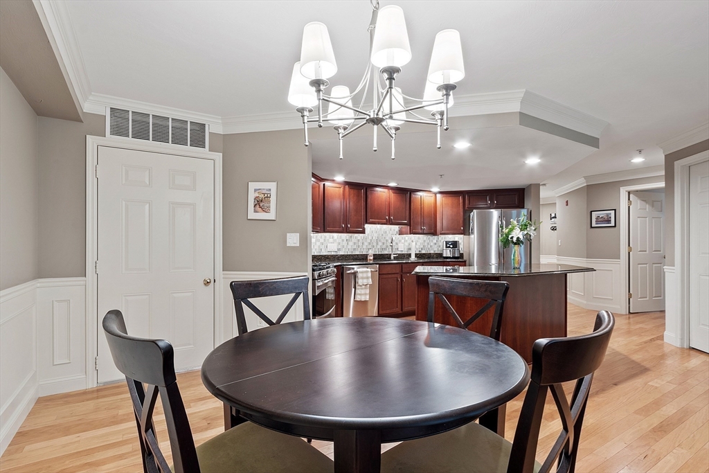 4 Sterling Hill Lane, Unit 424 Exeter, NH 03833 - Photo 7 of 24 a view of a dining room with furniture