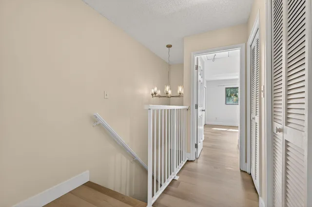 a view of empty room with ceiling fan
