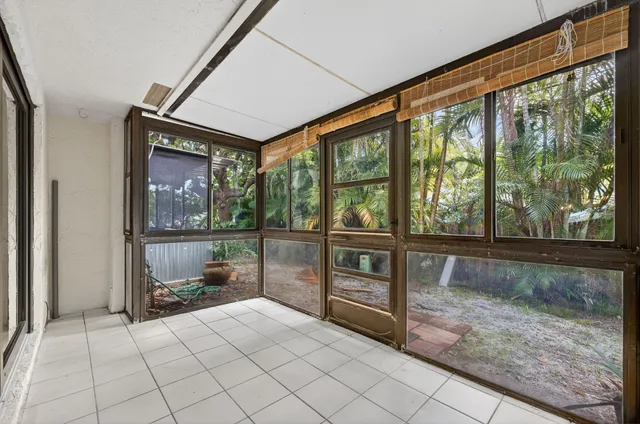 a view of a pathway both side of the house