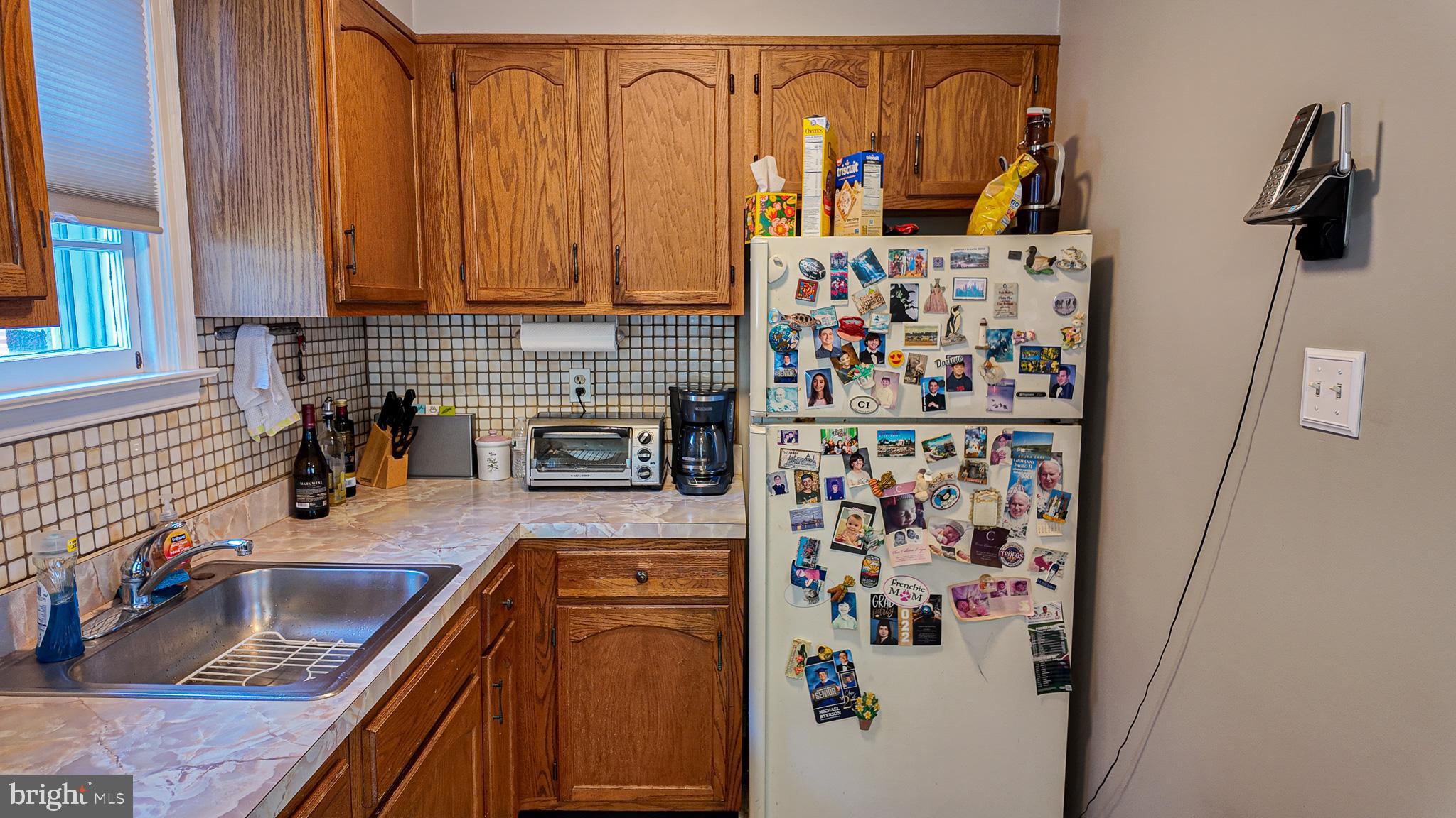 2013 Fuller Street Philadelphia, PA 19152 - Photo 12 of 27 a kitchen with stainless steel appliances granite countertop a refrigerator and a sink