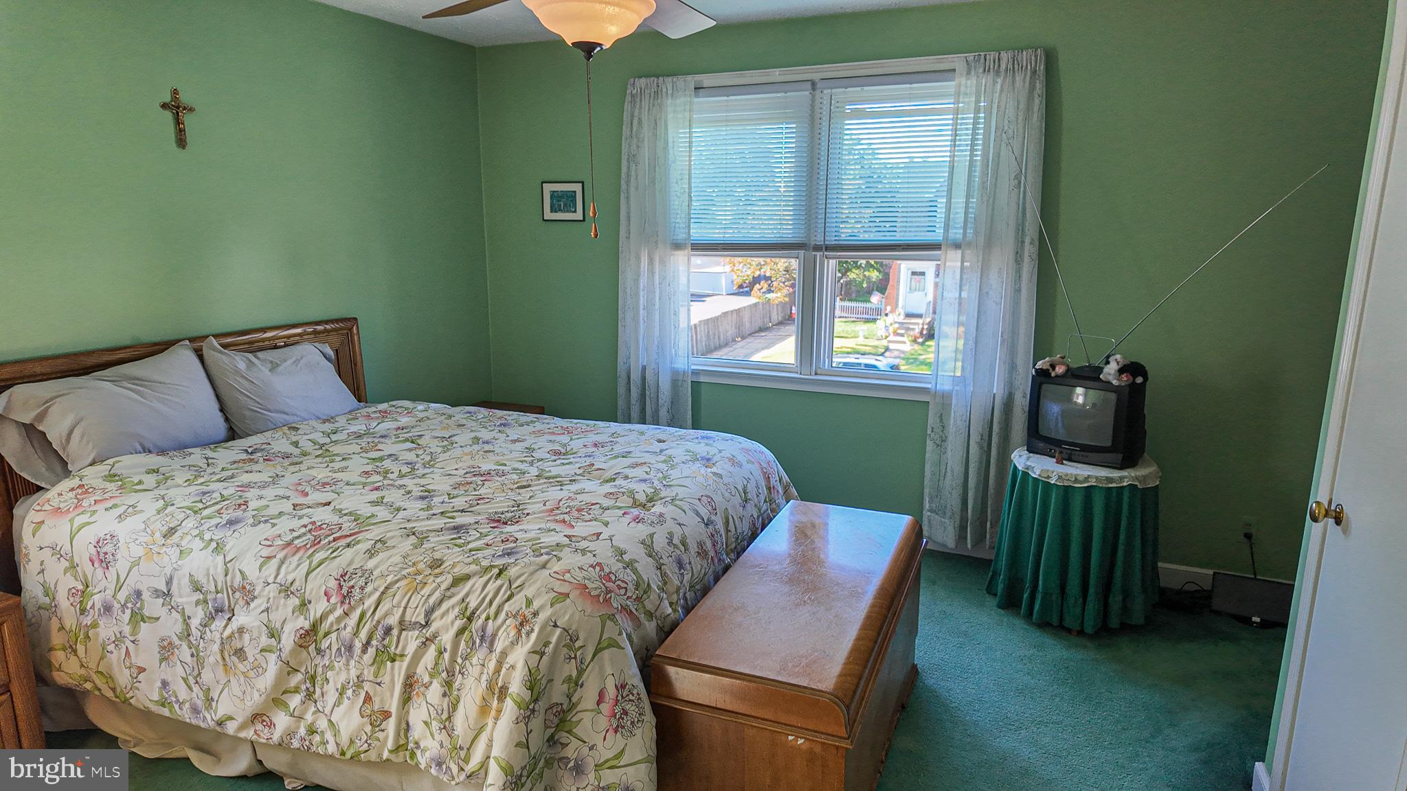 2013 Fuller Street Philadelphia, PA 19152 - Photo 13 of 27 a bedroom with a bed and a window
