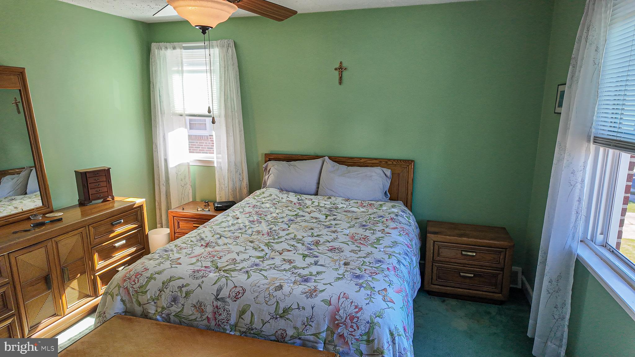 2013 Fuller Street Philadelphia, PA 19152 - Photo 14 of 27 a bedroom with a bed and a flat tv screen on dresser