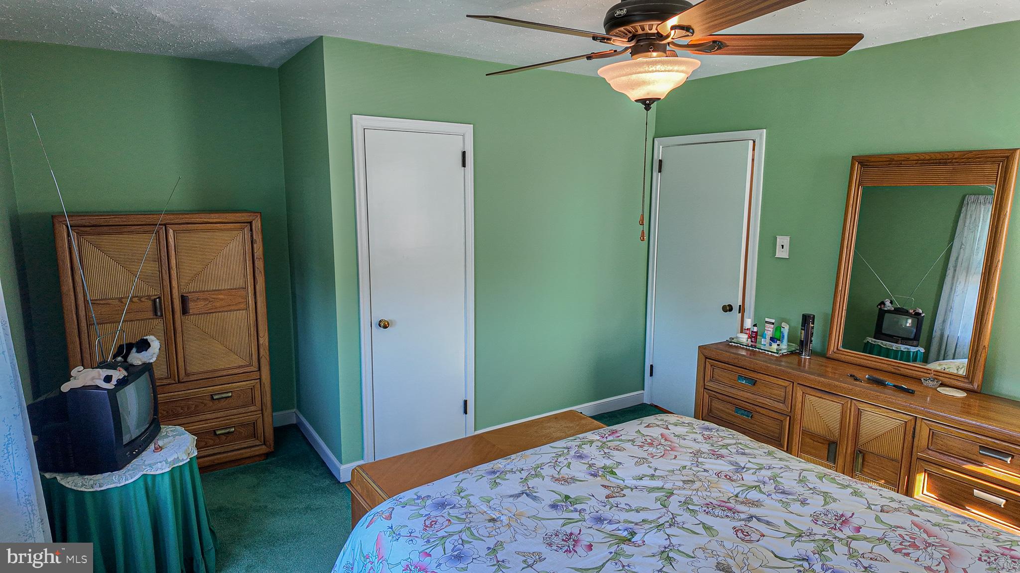 2013 Fuller Street Philadelphia, PA 19152 - Photo 15 of 27 a bedroom with a bed and a dresser