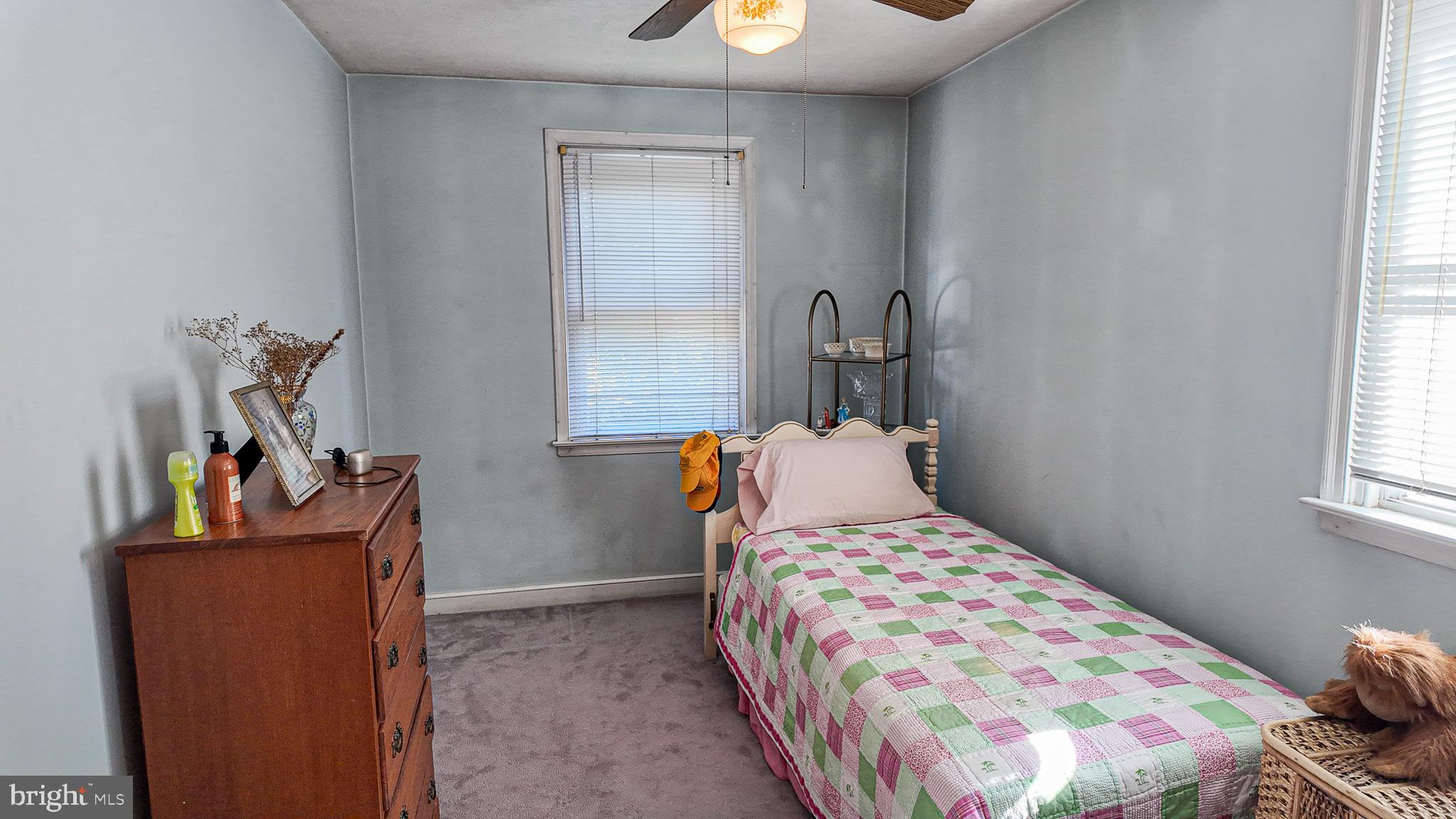 2013 Fuller Street Philadelphia, PA 19152 - Photo 18 of 27 a bedroom with a bed and a window