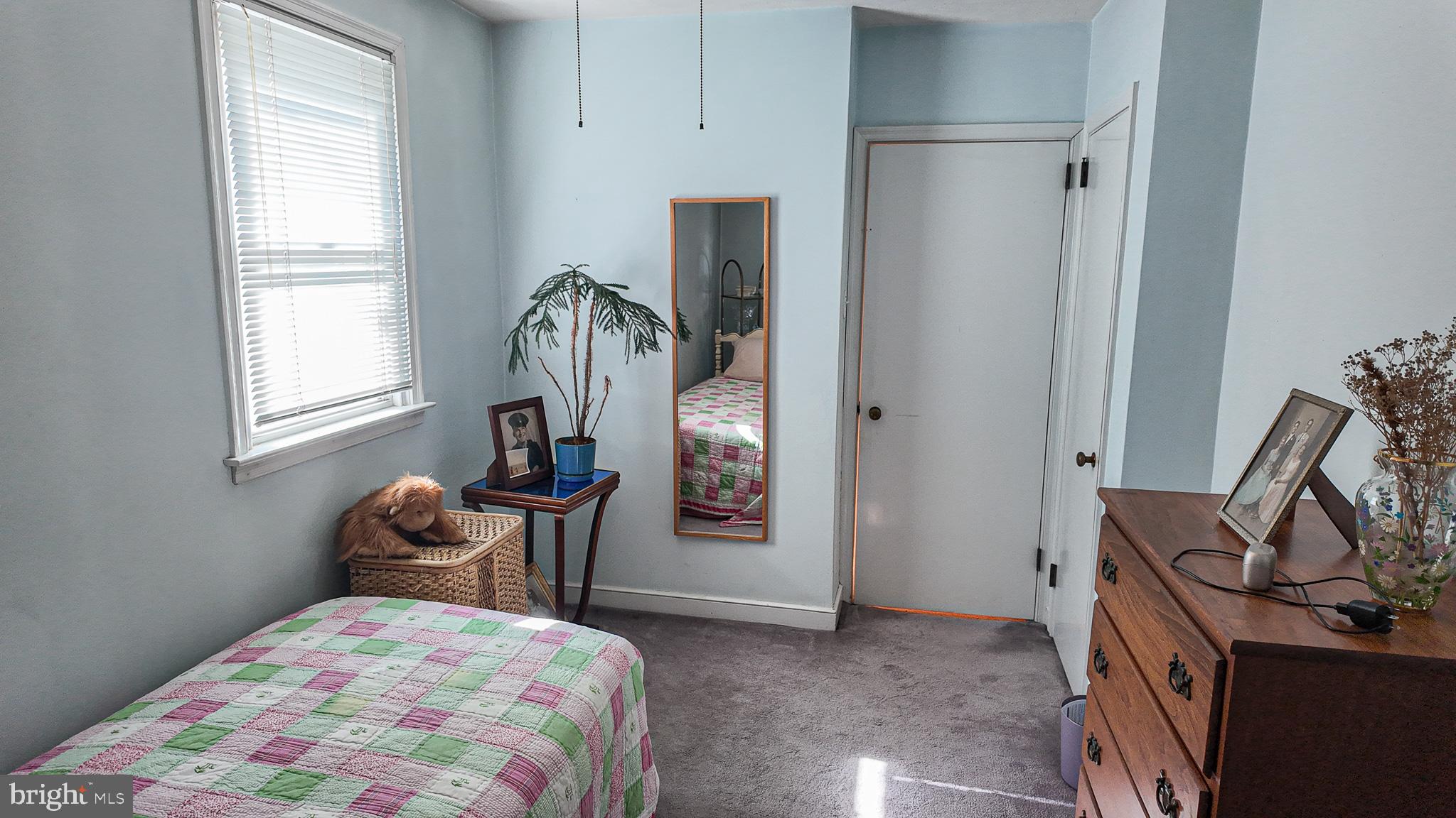 2013 Fuller Street Philadelphia, PA 19152 - Photo 19 of 27 a bedroom with a bed and a window