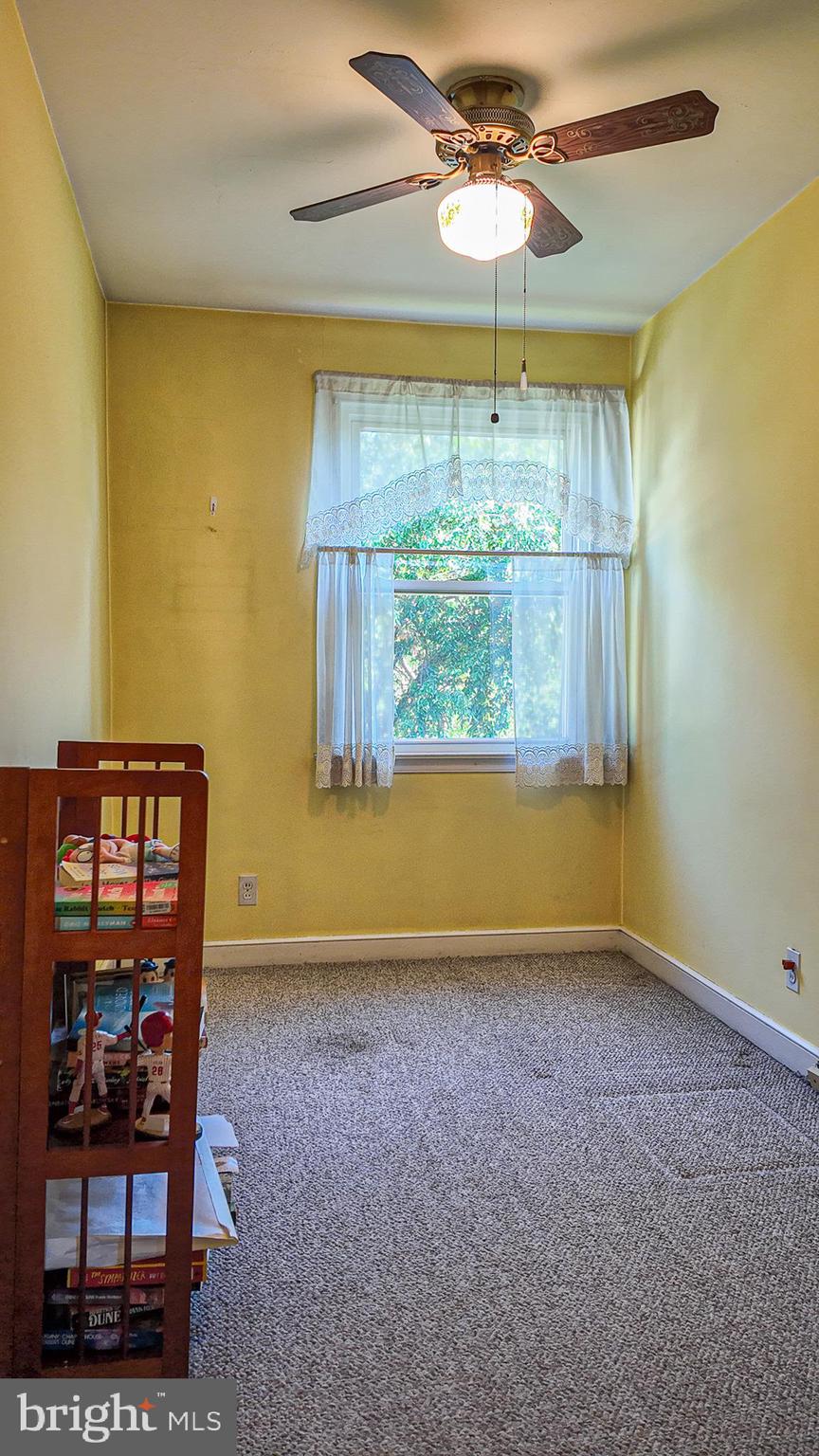 2013 Fuller Street Philadelphia, PA 19152 - Photo 20 of 27 a view of room with window and chandelier