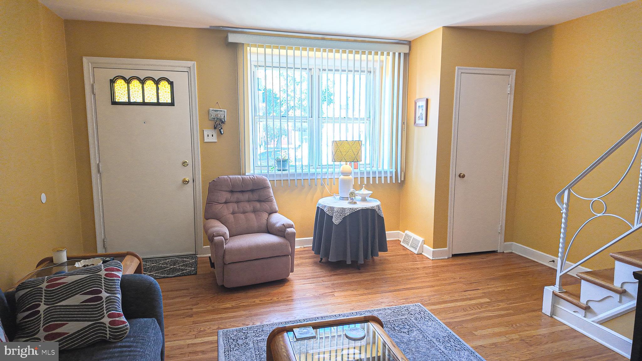 2013 Fuller Street Philadelphia, PA 19152 - Photo 6 of 27 a living room with furniture and a window
