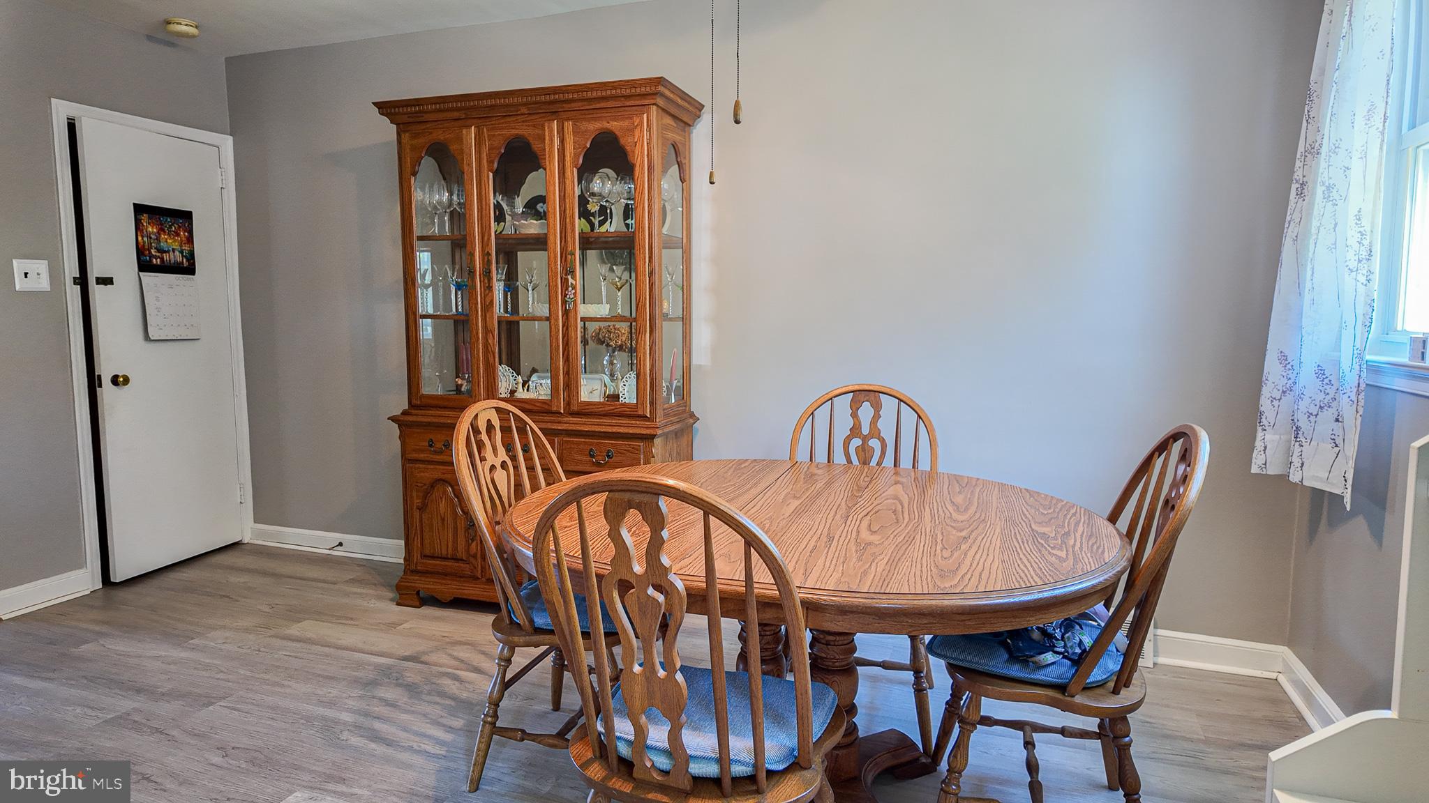 2013 Fuller Street Philadelphia, PA 19152 - Photo 9 of 27 a view of a dining room with furniture window and wooden floor