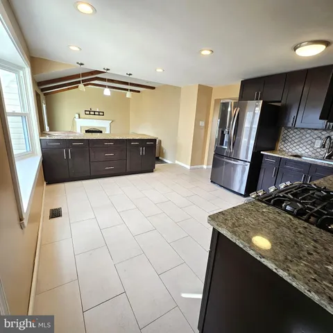 a bathroom with a sink a vanity and mirror
