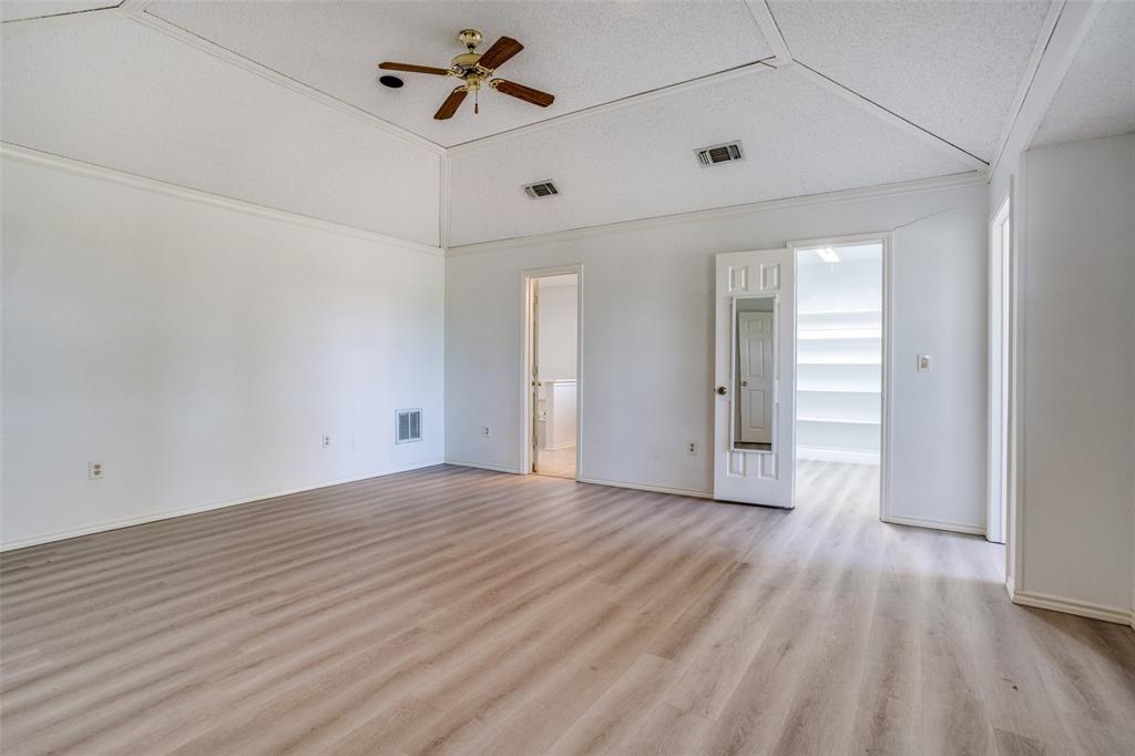 7397 Fm 1377 Blue Ridge, TX 75424 - Photo 13 of 27 a view of empty room with wooden floor and fan