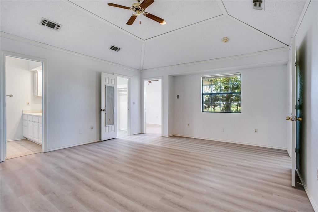7397 Fm 1377 Blue Ridge, TX 75424 - Photo 14 of 27 a view of an empty room with a window and wooden floor