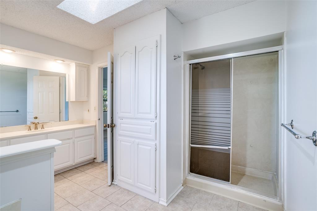 7397 Fm 1377 Blue Ridge, TX 75424 - Photo 16 of 27 a bathroom with a sink a mirror and a bathtub