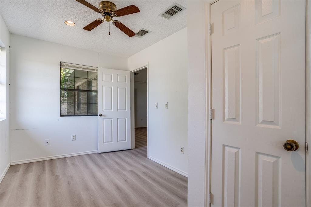 7397 Fm 1377 Blue Ridge, TX 75424 - Photo 18 of 27 a view of empty room with ceiling fan