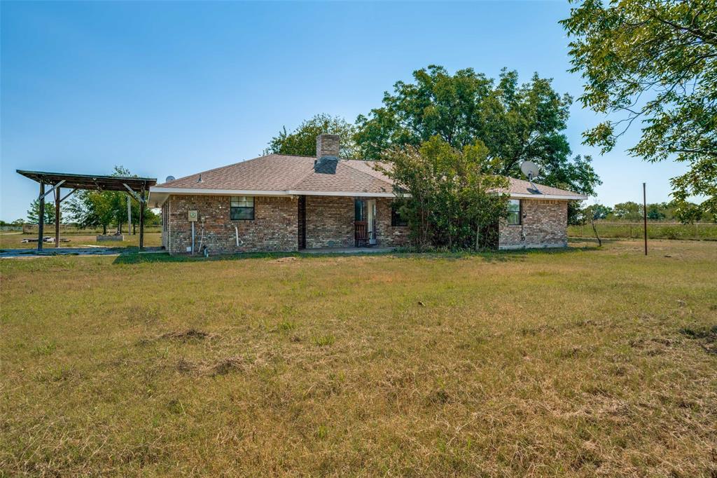 7397 Fm 1377 Blue Ridge, TX 75424 - Photo 3 of 27 a view of a house with a yard