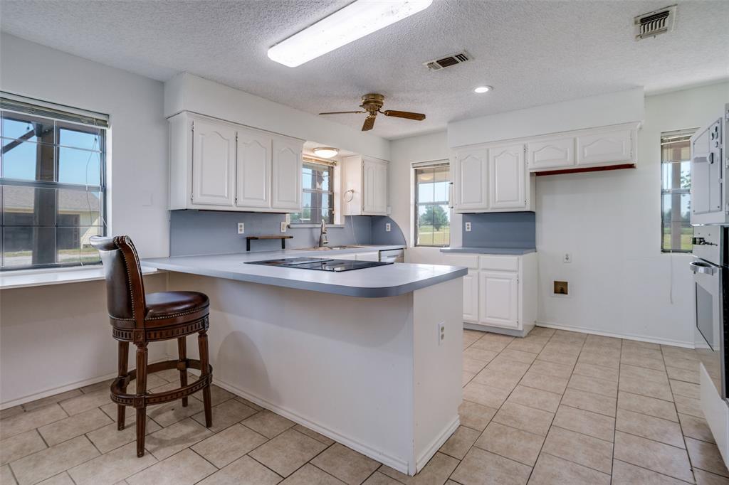 7397 Fm 1377 Blue Ridge, TX 75424 - Photo 10 of 27 a kitchen with a sink cabinets and window