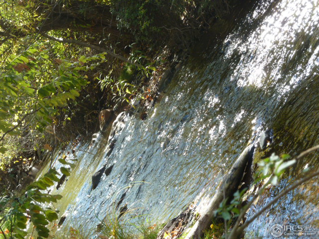 841 Gapter Road Boulder, CO 80303 - Photo 2 of 25 South Boulder Creek on west end of property