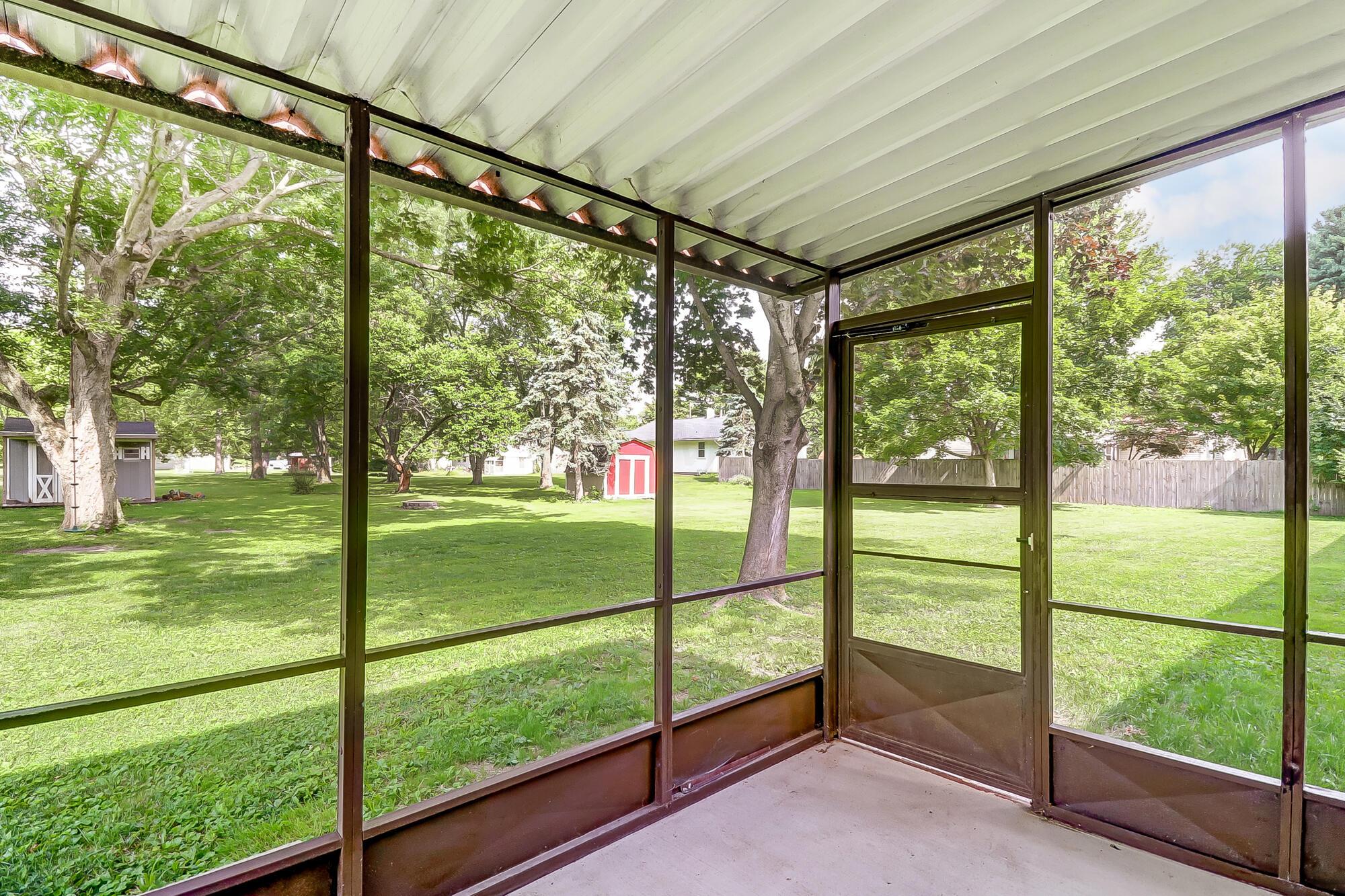 5645 Sinclair Road Columbus, OH 43229 - Photo 32 of 37 Screened In Porch to BY