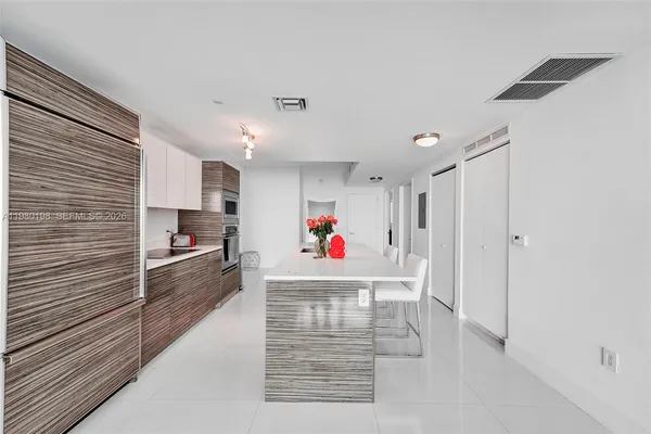 a room with a chair and a chair