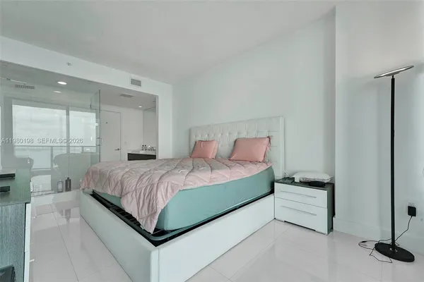 a view of a balcony with furniture