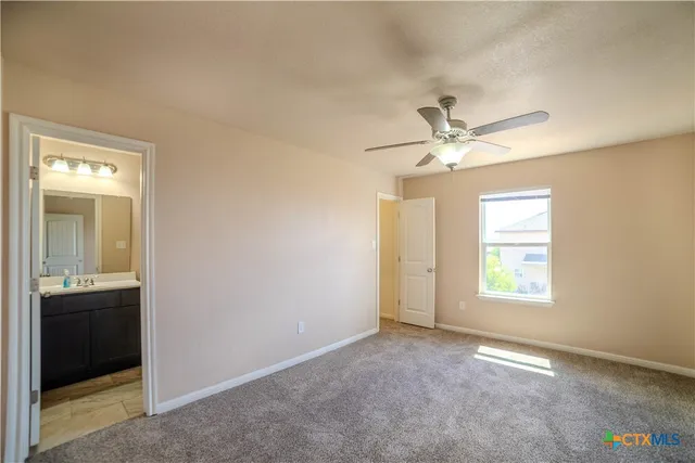 an empty room that has a window