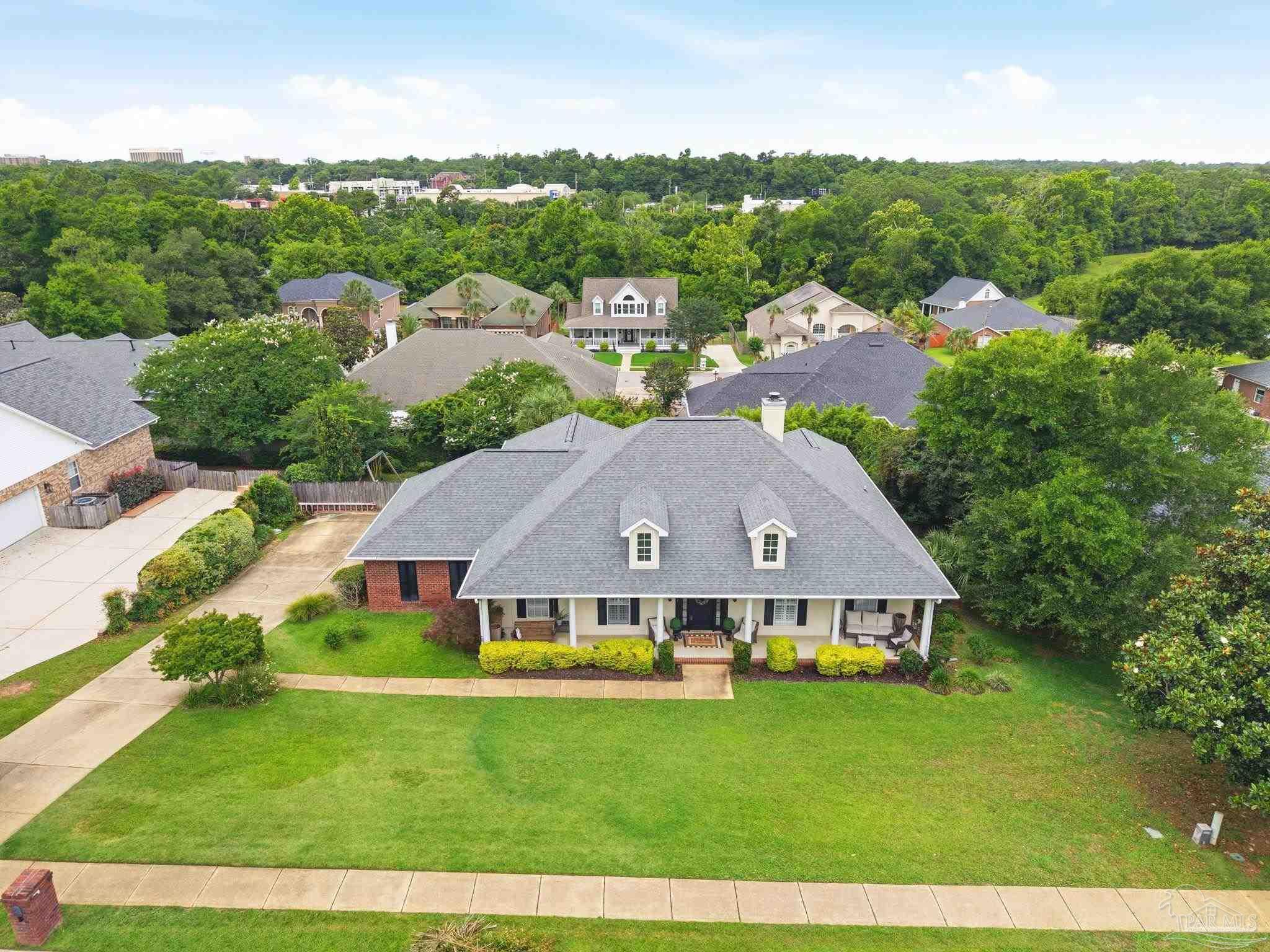 5931 Otter Point Road Pensacola, FL 32504 - Photo 67 of 67 a aerial view of a house with garden