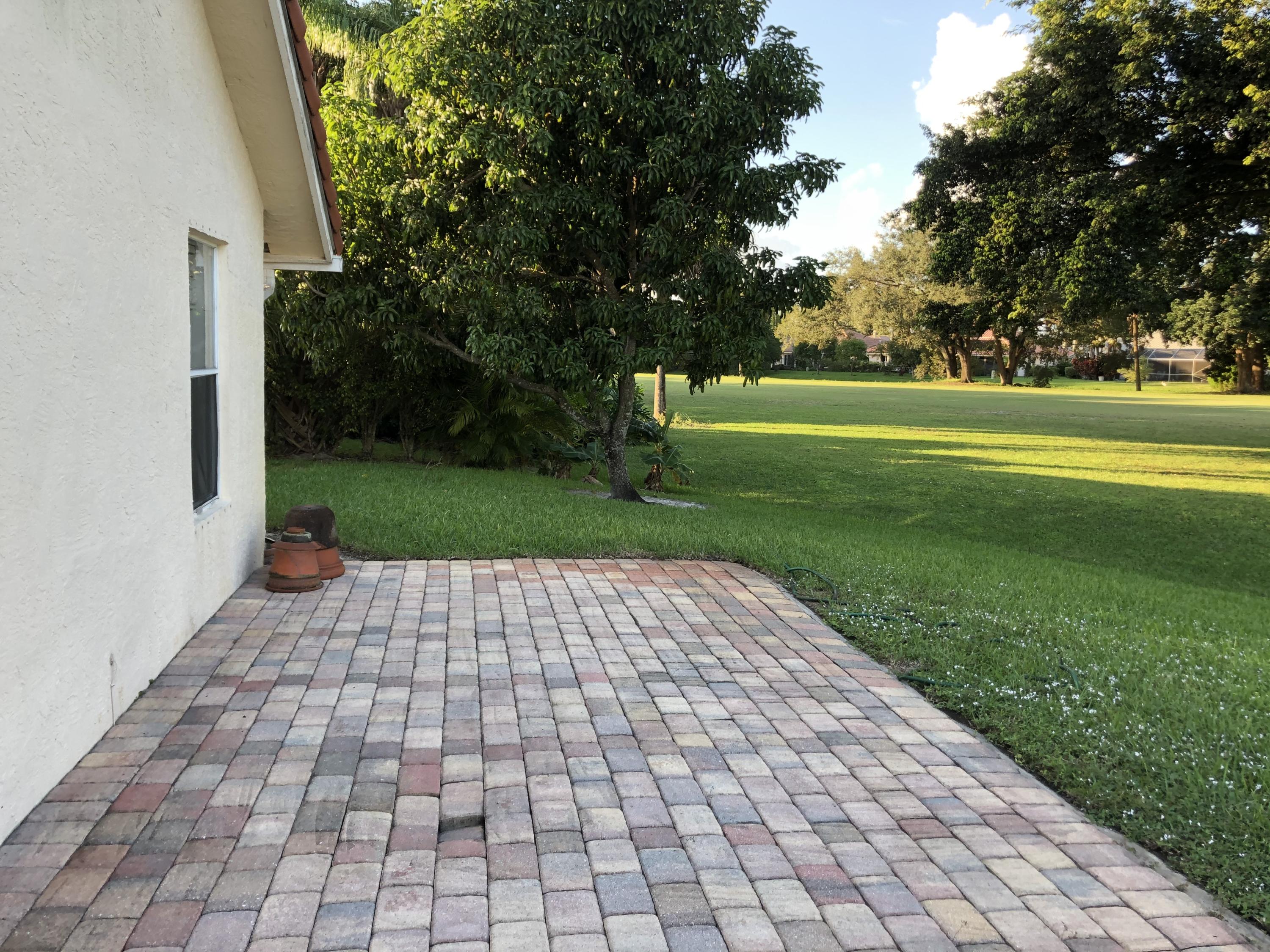 10337 Milburn Lane Boca Raton, FL 33498 - Photo 15 of 17 Back Patio to Lake