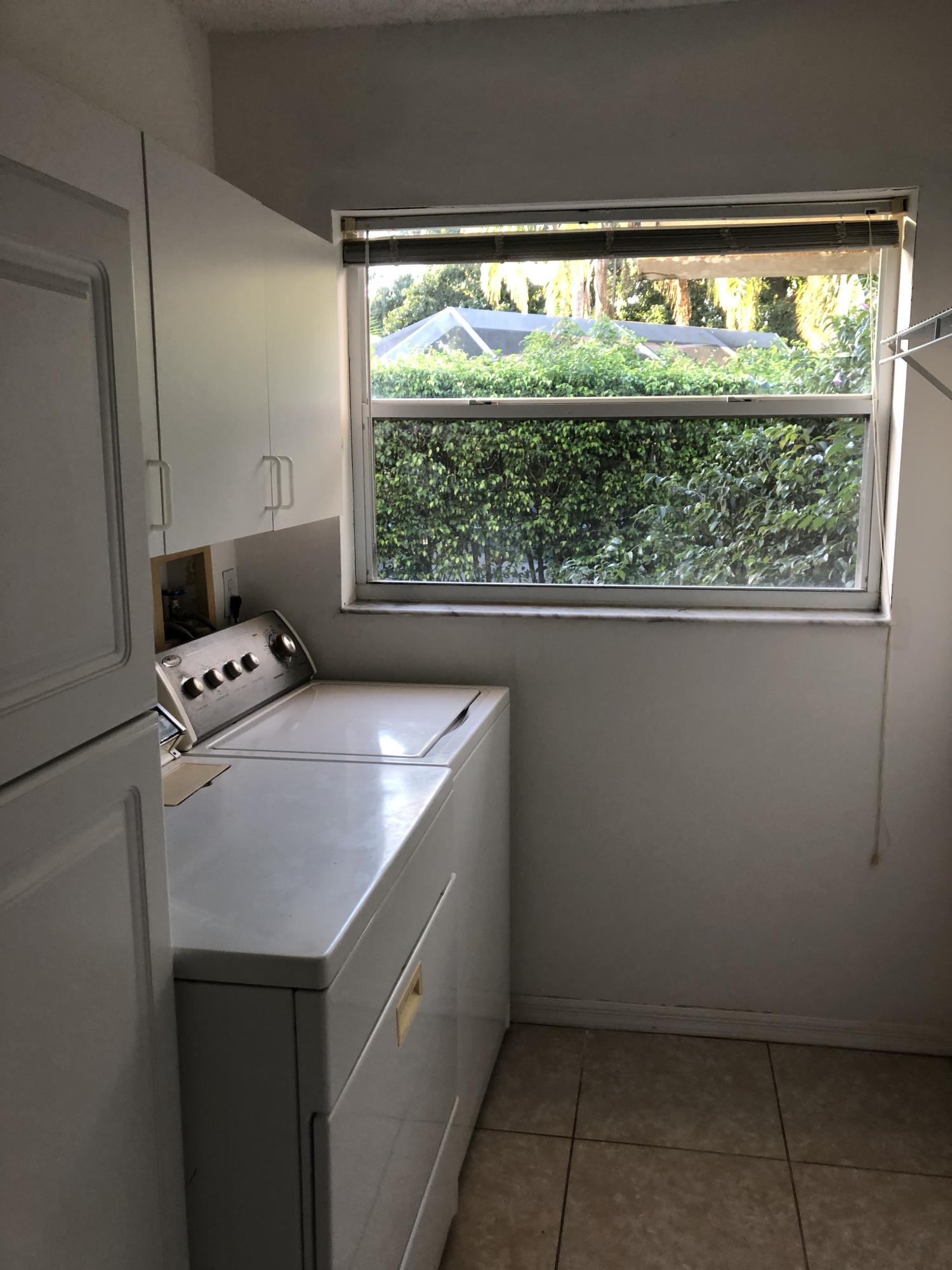 10337 Milburn Lane Boca Raton, FL 33498 - Photo 9 of 17 Laundry Room Inside