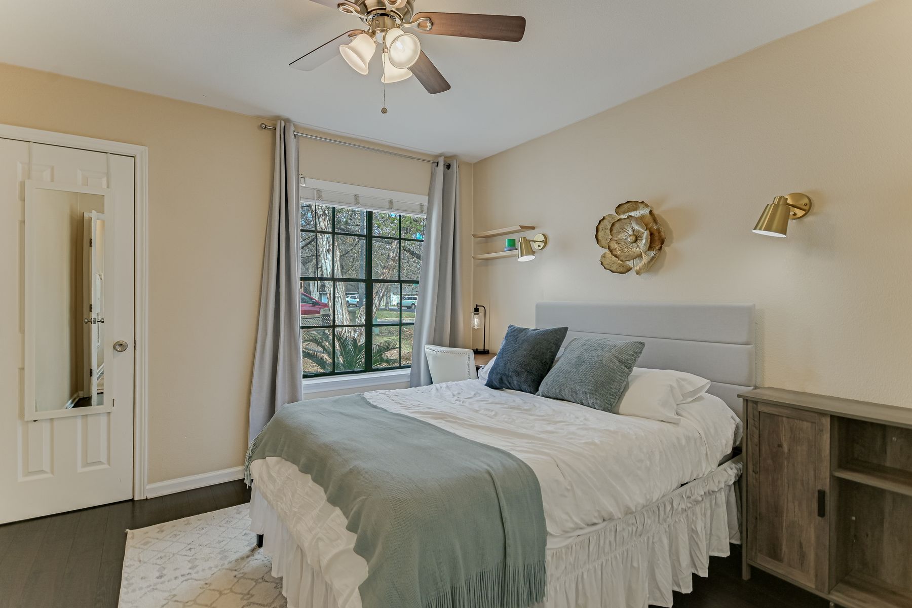2605 Garrettson Drive, Unit A Austin, TX 78748 - Photo 12 of 21 a bedroom with a large bed and a window