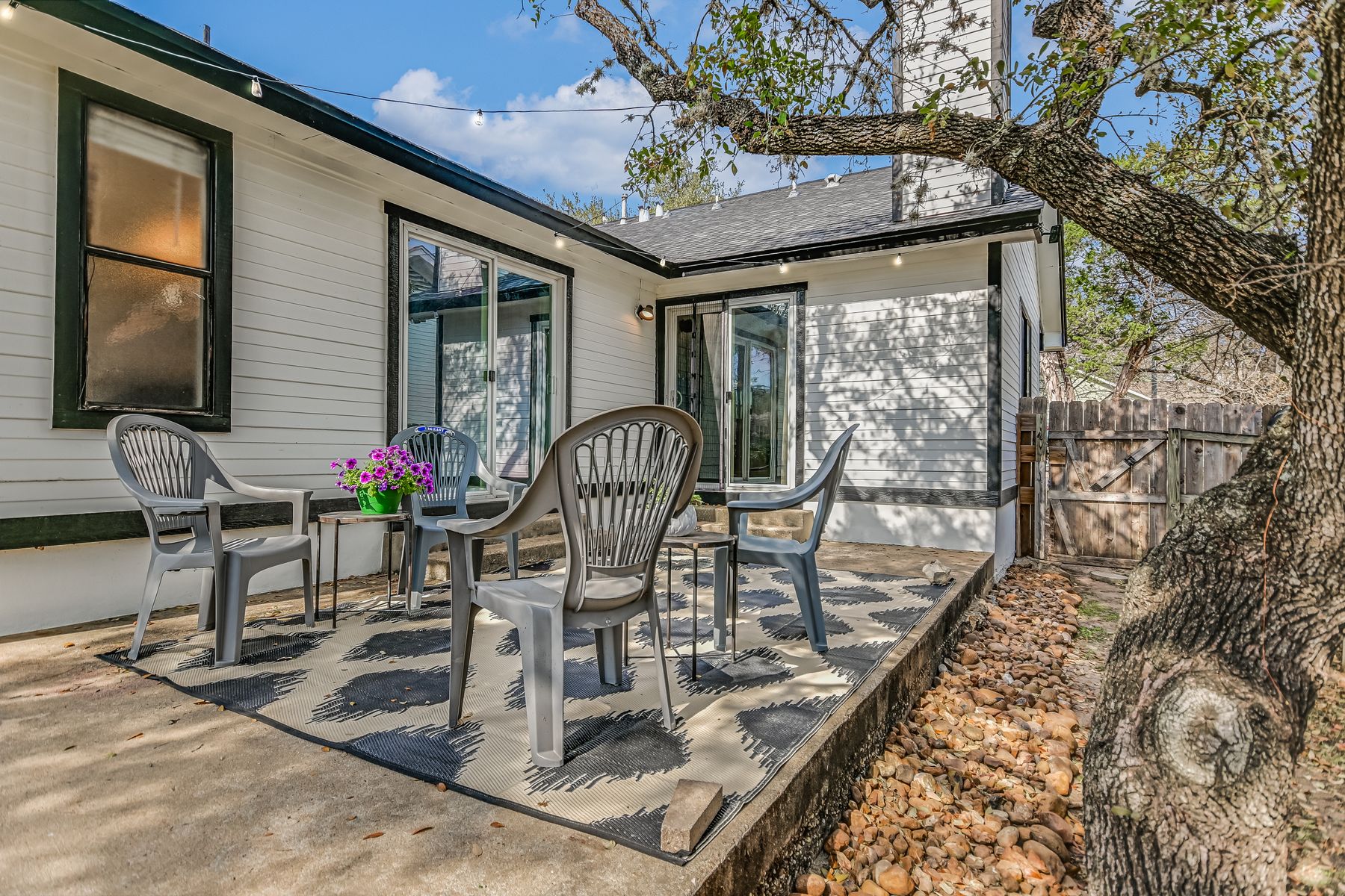 2605 Garrettson Drive, Unit A Austin, TX 78748 - Photo 15 of 21 a view of a patio with a table and chairs