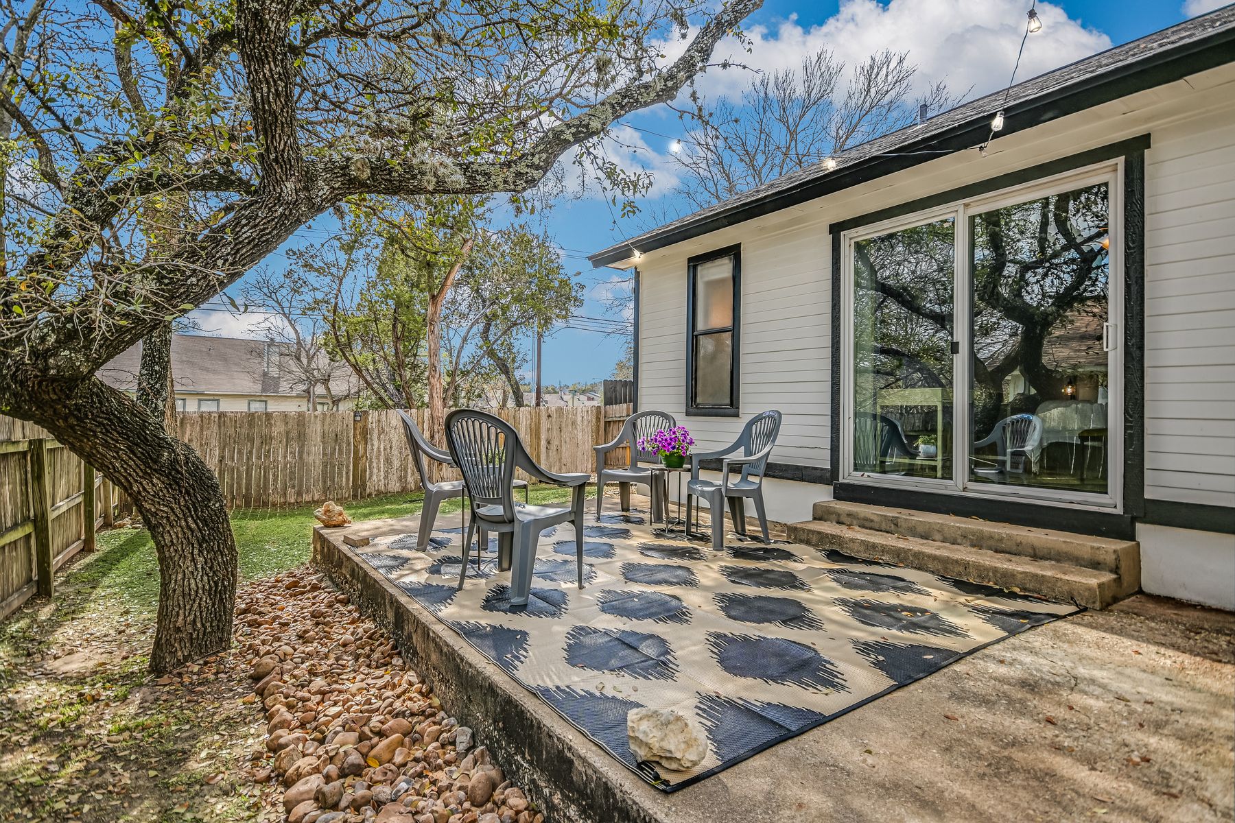 2605 Garrettson Drive, Unit A Austin, TX 78748 - Photo 16 of 21 a view of a tables and chairs in the patio