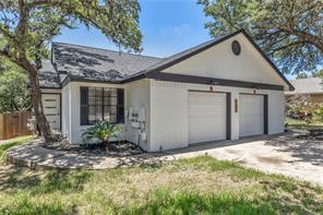 2605 Garrettson Drive, Unit A Austin, TX 78748 - Photo 21 of 21 a front view of a house with garden